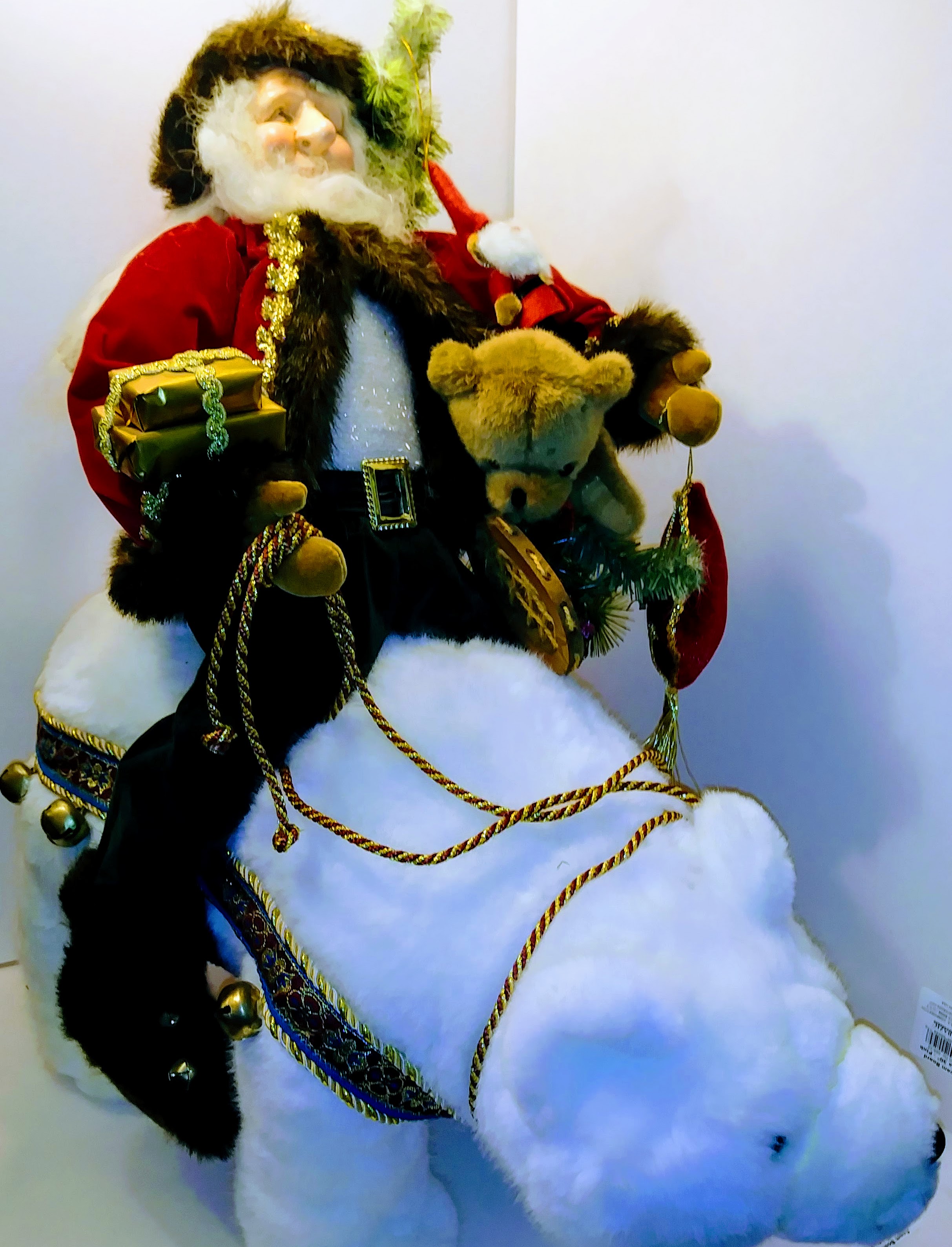 Decorative Santa Claus Figure with Polar Bear and Greenery